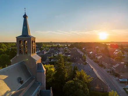 Swolgen from above at sunset, with the church tower in the foreground