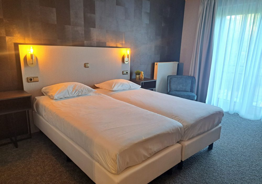 Comfort Kamer - Bed bij Parkhotel Horst