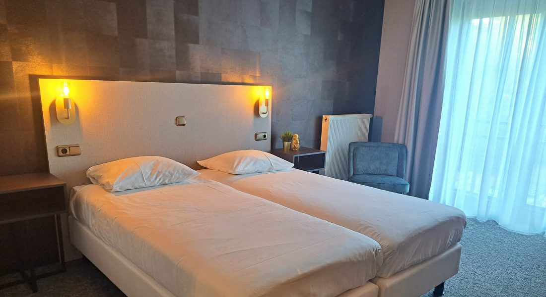 Comfort Kamer - Bed bij Parkhotel Horst