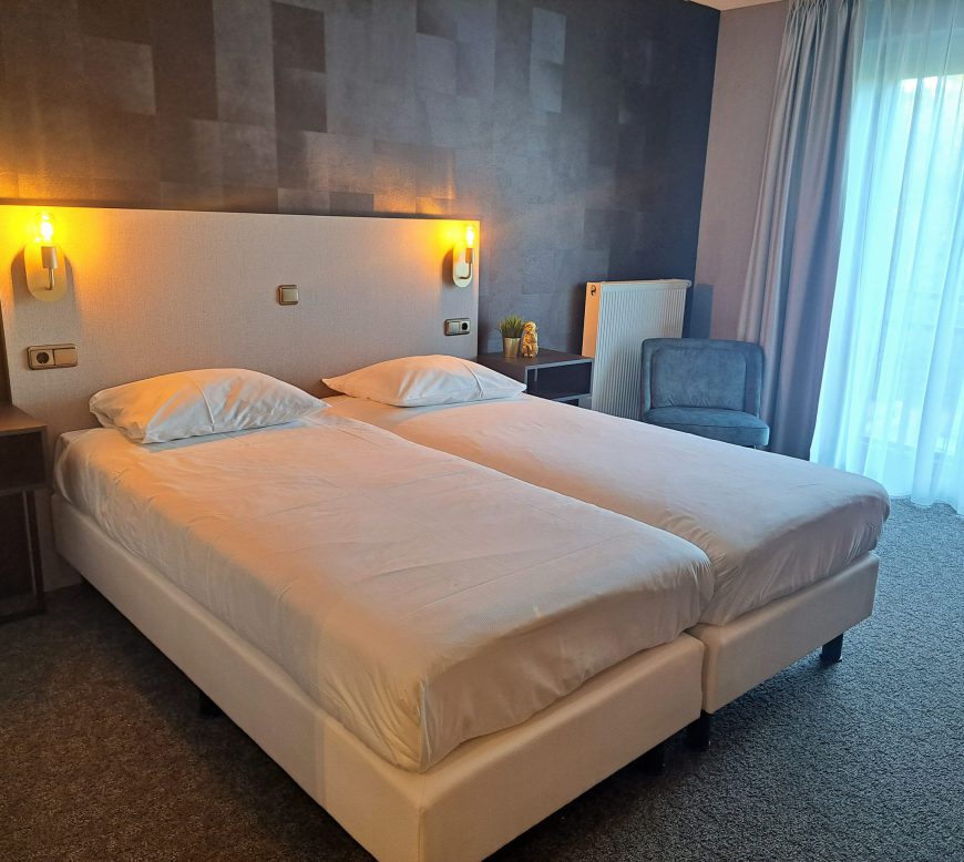 Comfort Kamer - Bed bij Parkhotel Horst