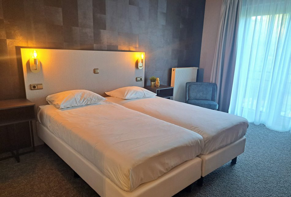 Comfort Kamer - Bed bij Parkhotel Horst