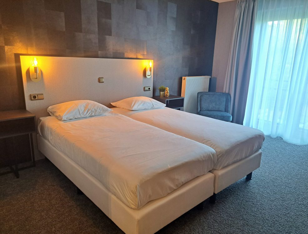 Comfort Kamer - Bed bij Parkhotel Horst