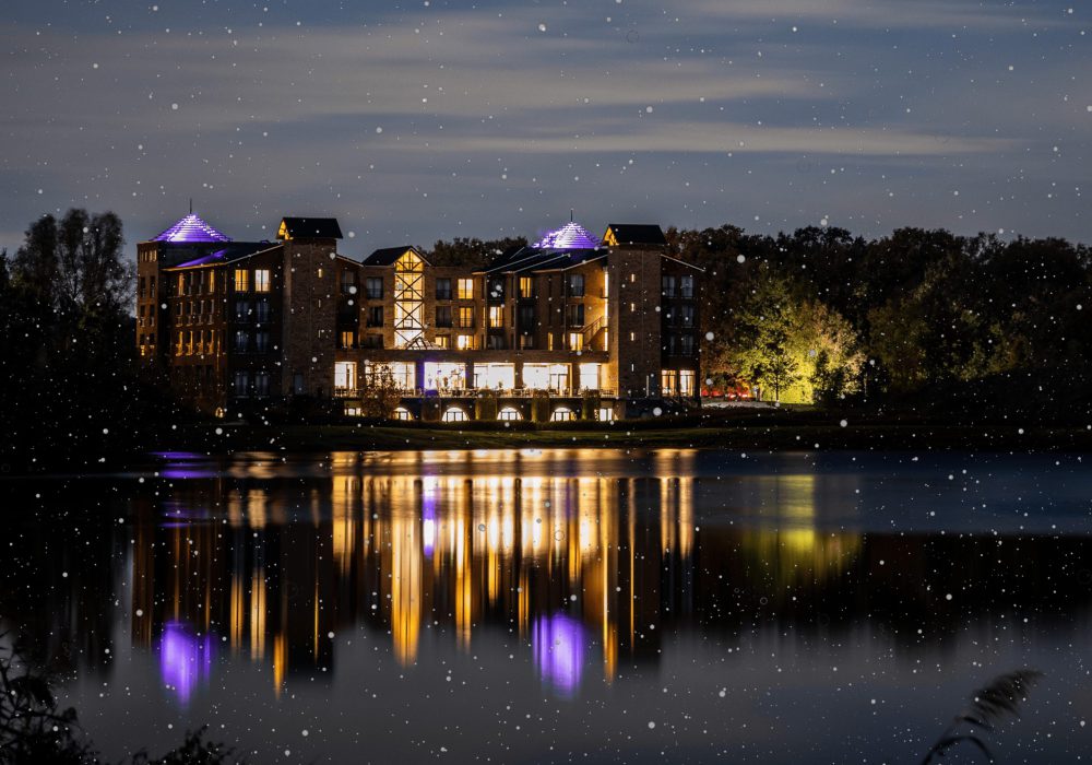 Parkhotel at night with snow